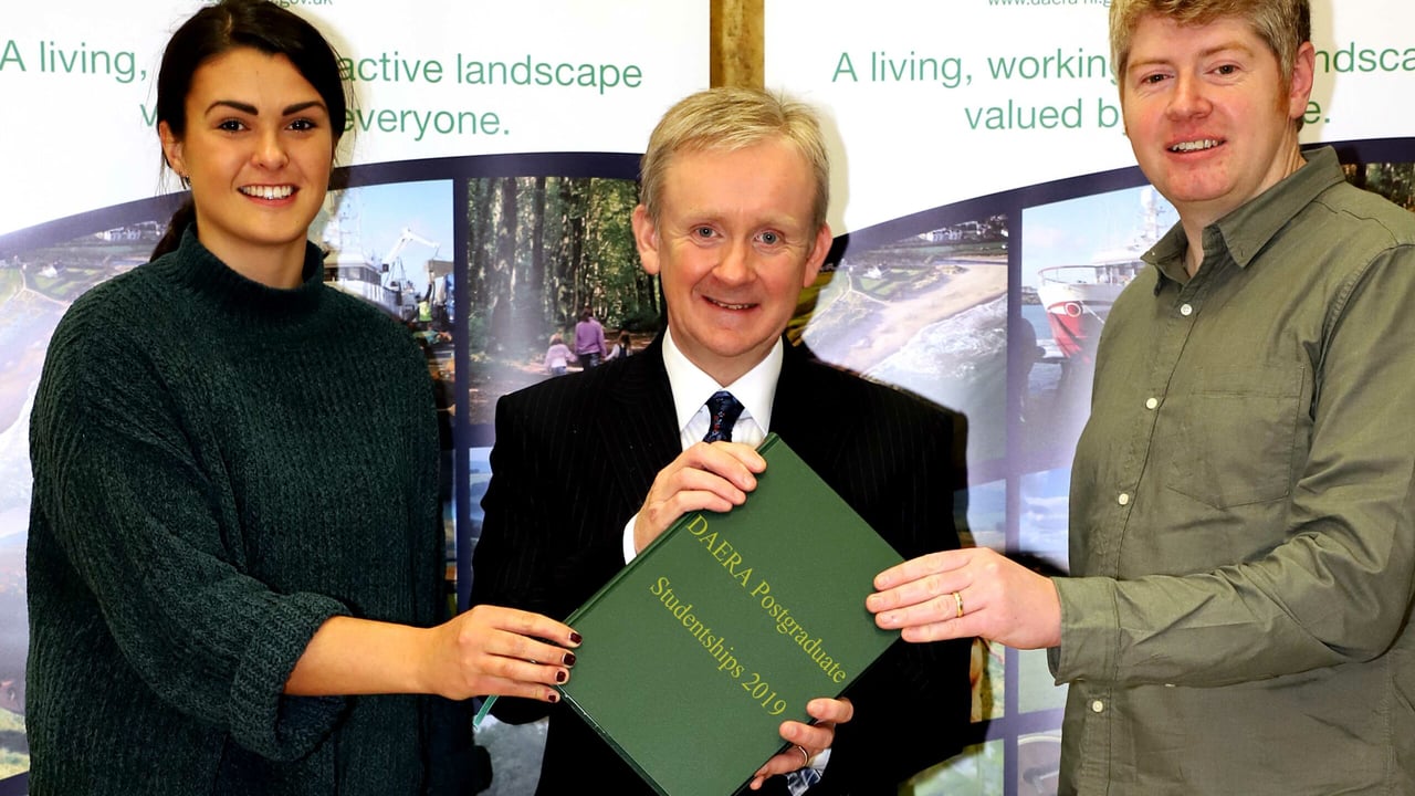 DAERA Permanent Secretary Dr. Denis McMahon launches the 2019 Postgraduate Studentship Competition with PhD students Kerry McIlwaine (left) and Jonathan Blair (right)