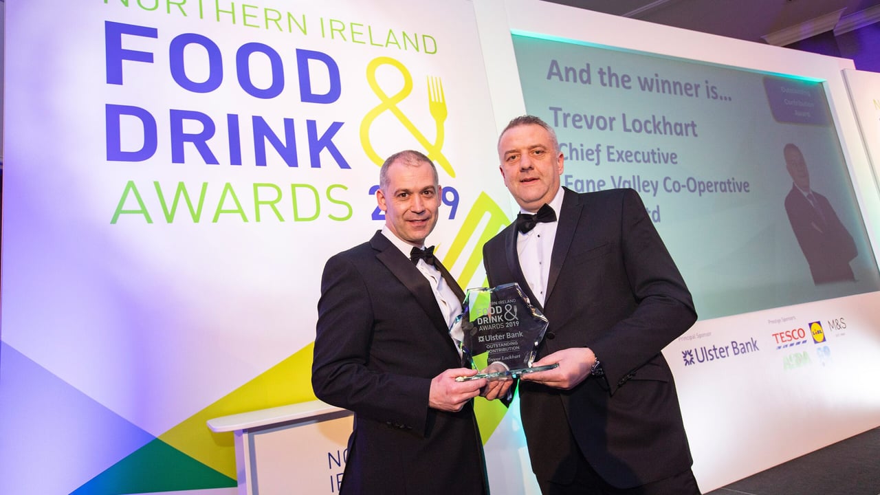 Nigel Walsh from Ulster Bank presents Trevor Lockhart with the Outstanding Contribution to the Industry award