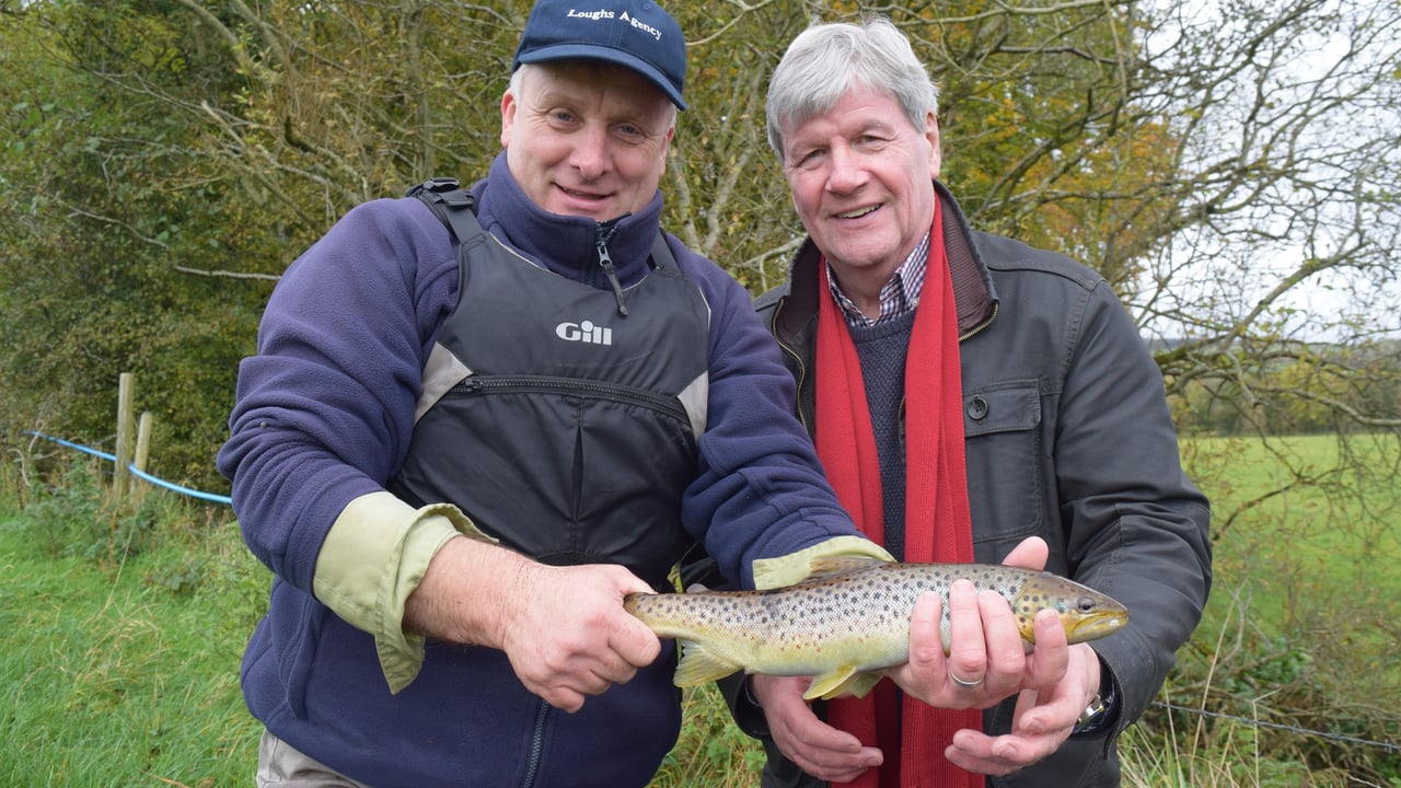 Lionel Knobbs of the Loughs Agency introduces Joe Mahon to one of his success stories on the Altnarigh Burn