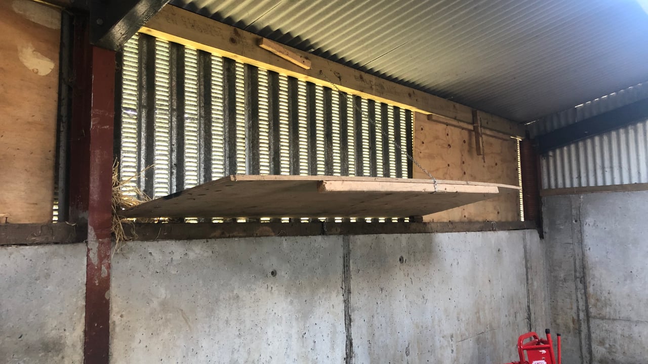 Adjustable wooden boards installed to cover the vented sheeting