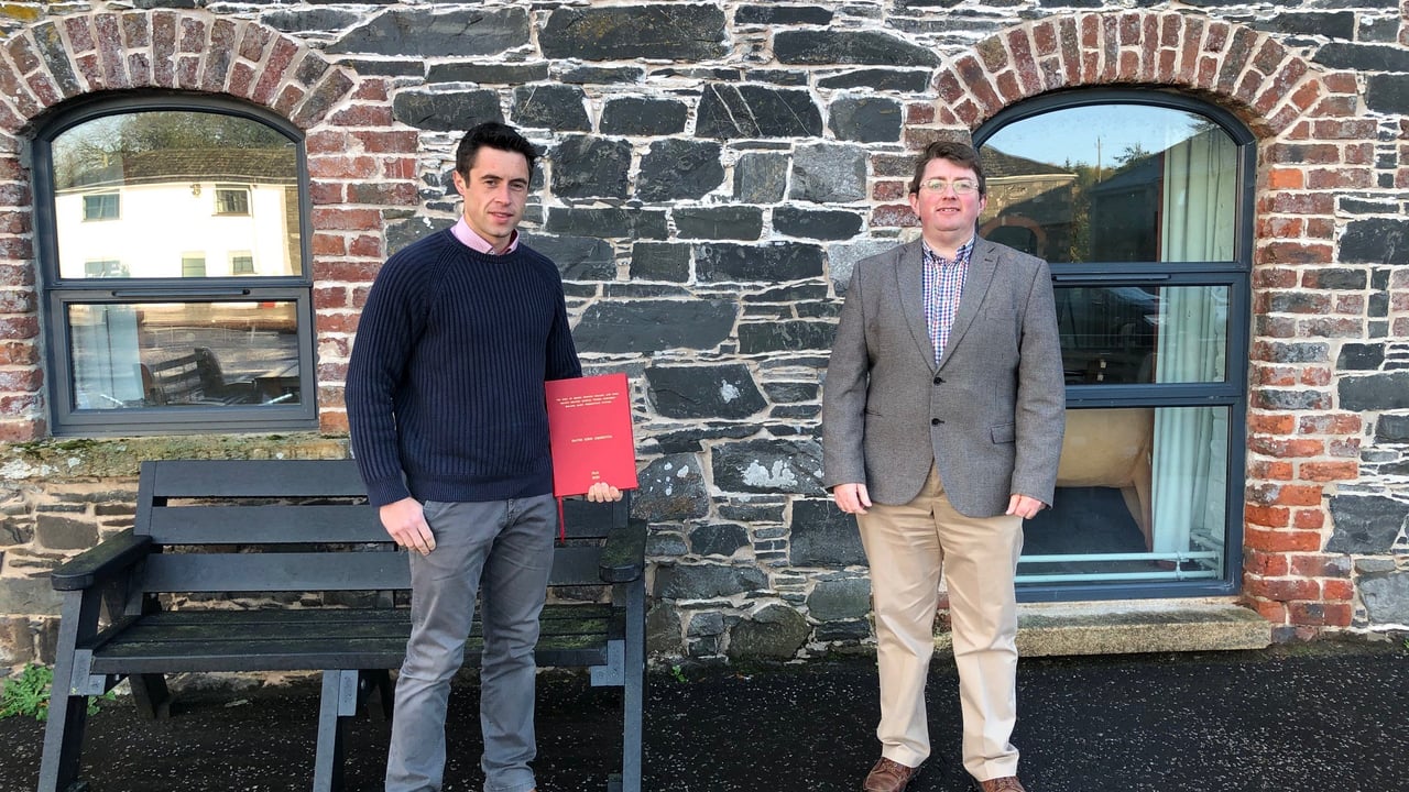 Jason Rankin (right), general manager of AgriSearch congratulates Dr. David Johnston (left) on the successful completion of his PhD
