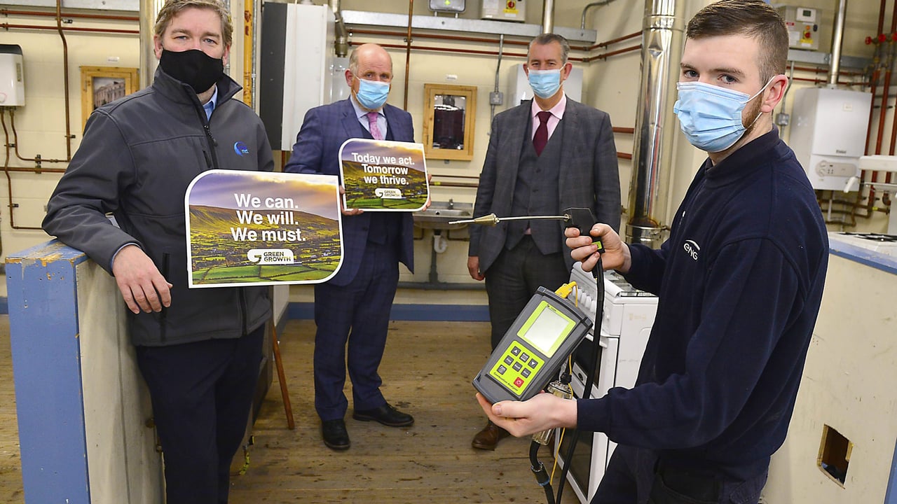 L-r: Chris Corken, Head of Department for science, engineering and construction at Belfast Metropolitan College; Paul McCormack, lead partner of GenComm; Minister Edwin Poots; and Eamon Kerr