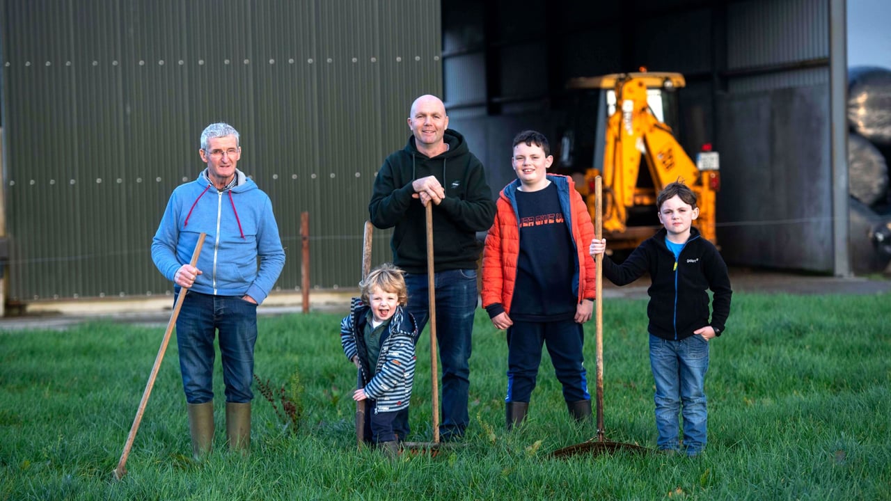 Tom Spillane, with his children and father