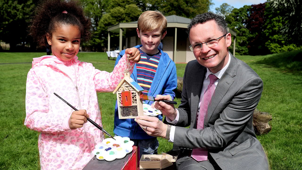 Patrick O’Donovan T.D., Minister of State with responsibility for the Office of Public Works, Daniella Ebuzor and Christian Smullen at the Phoenix Park.   
Source: Maxwells