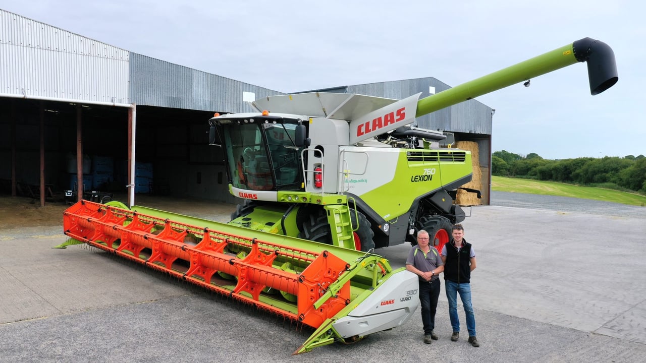 John and Conor Crean Murphy of CM Farms in Co. Wexford, with their newly bought Claas Lexion 760