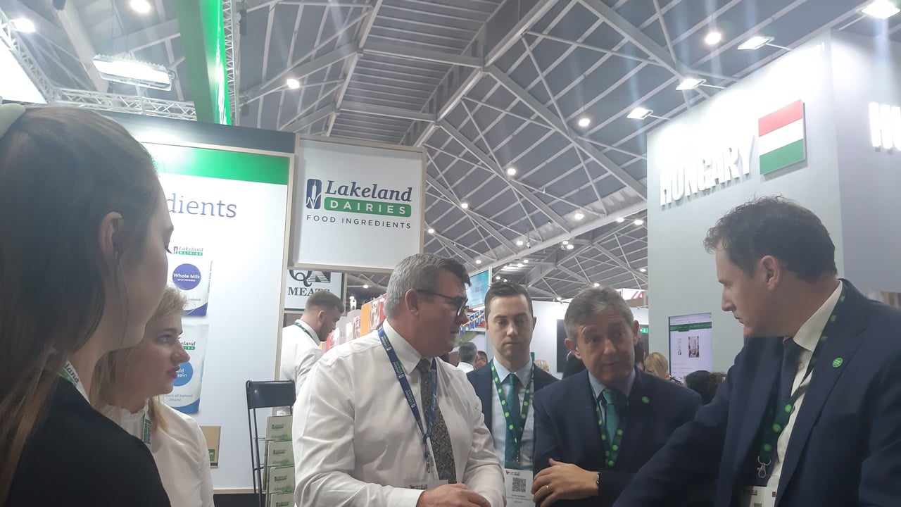 Minister for Agriculture, Food and the Marine, Charlie McConalogue speaking with Des Hurley, sales development with Lakeland Dairies at the Food and Hotel Asia trade show in Singapore