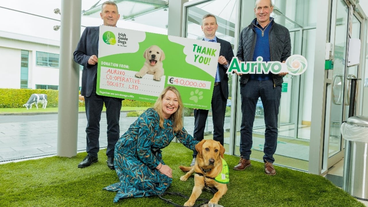 Marilyn Phillips with puppy in training Rivo, James McCarrick, John Burke, and Raymond Barlow of Aurivo. Image: Aurivo