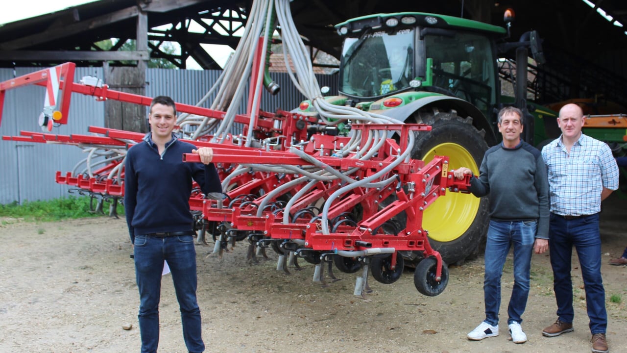 Arnaud and Jean Cristoph Rousselat demonstrate their combined mechanical weeder and seed drill to Lemken's Derek Delahunty (right)