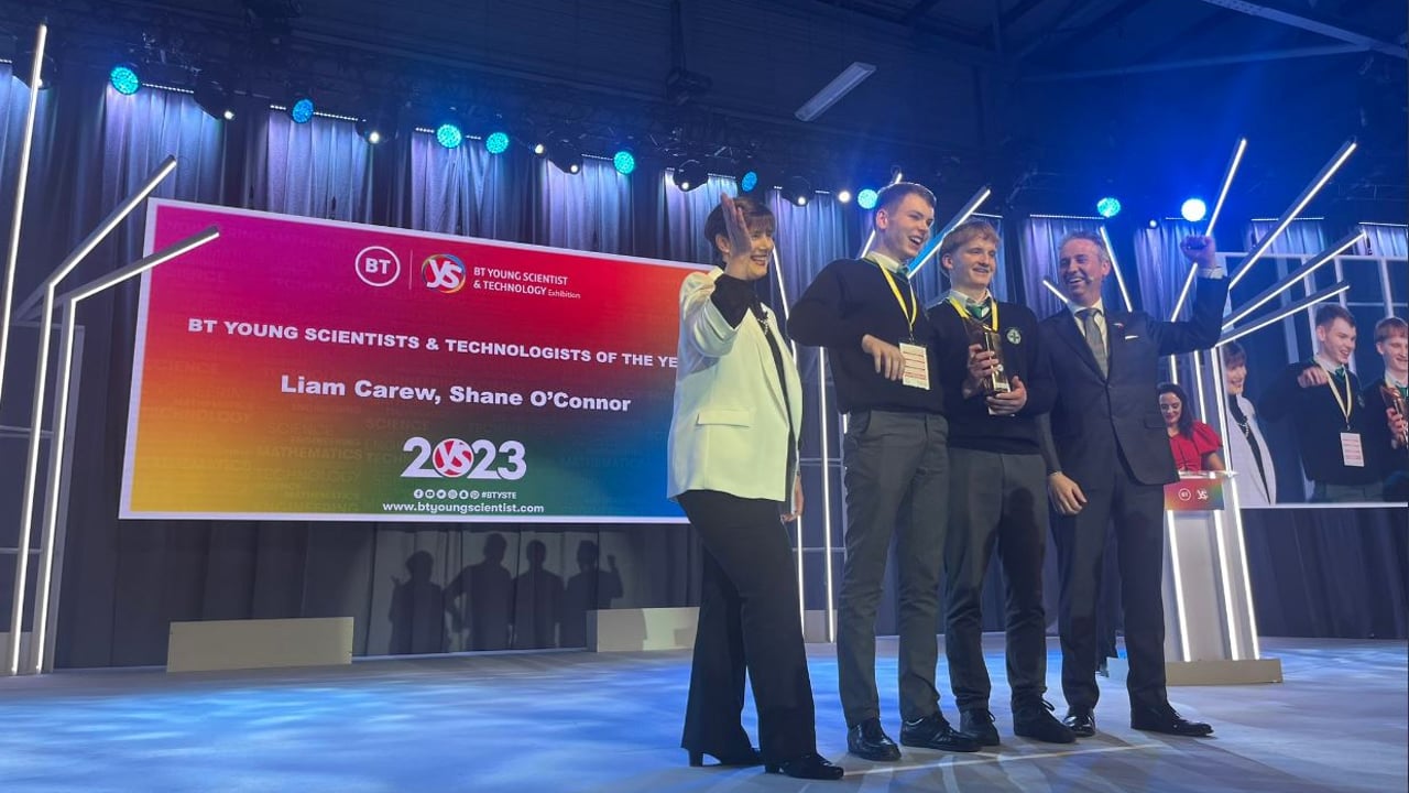 Shane O'Connor and Liam Carew being presented the award by education minister Norma Foley and BT managing director, Shay Walsh. Image: @BTYSTE Twitter