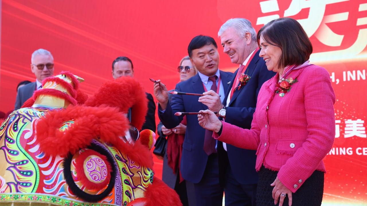 Bimeda chair, Donal Tierney and Ireland’s Ambassador to China, Dr Ann Derwin take part in a traditional Dragon Dance ceremony in China Source: Bimeda