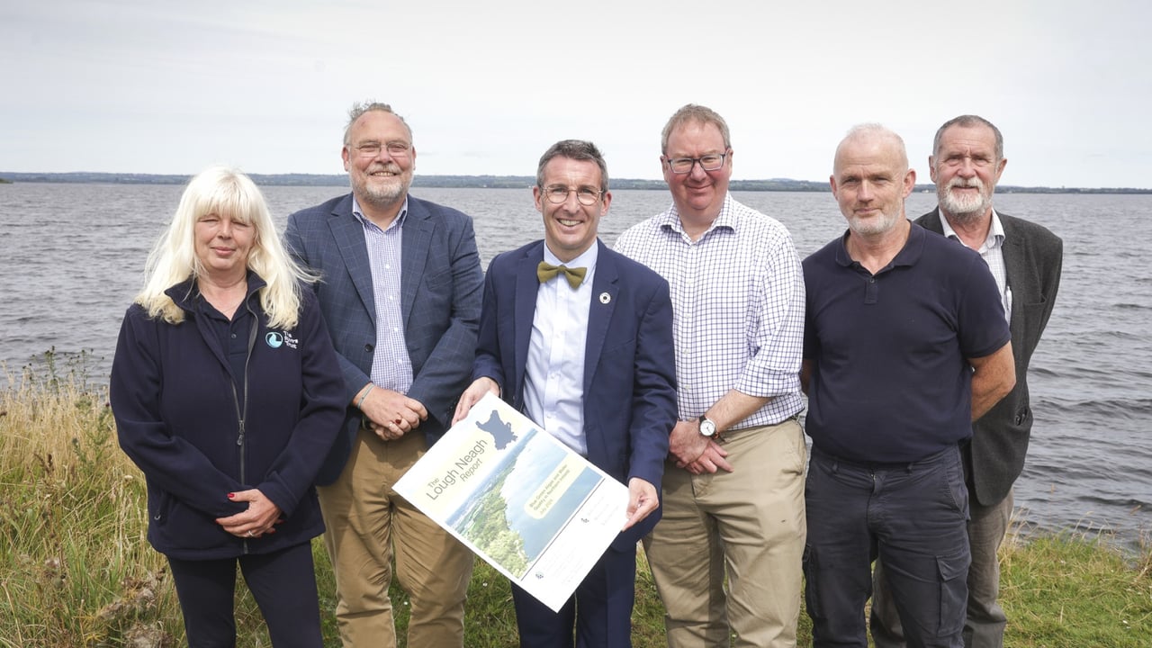 Minister Andrew Muir with a range of stakeholders on the shores of Lough Neagh. Image: DAERA
