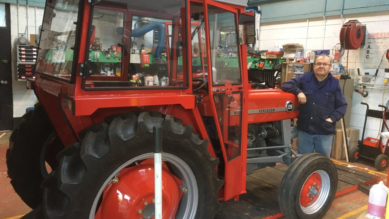 The late Victor hard at work restoring the 135 Massey Ferguson, bought by Henry McIlhinney in the ’60s.