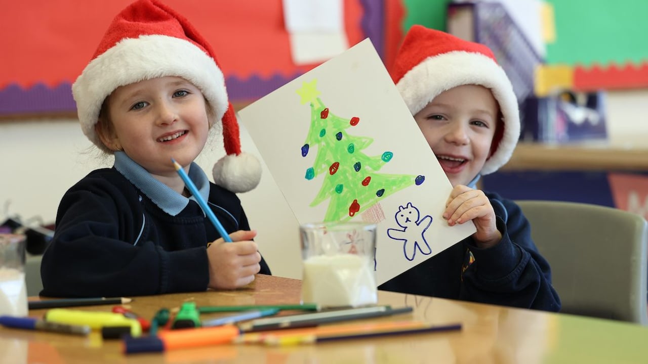 Callie Trimble and Sam O'Connell both aged 5, designing their Christmas cards at Scoil Eoin School, Kilbarrack, Co. Dublin. Source: National Dairy Council (NDC)