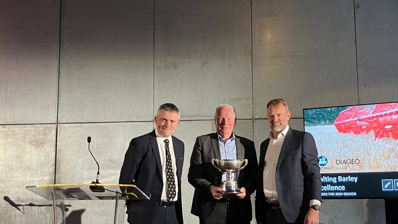 Liam Day Sr accepting the Irish Malting Barley Excellence Award on behalf of his son