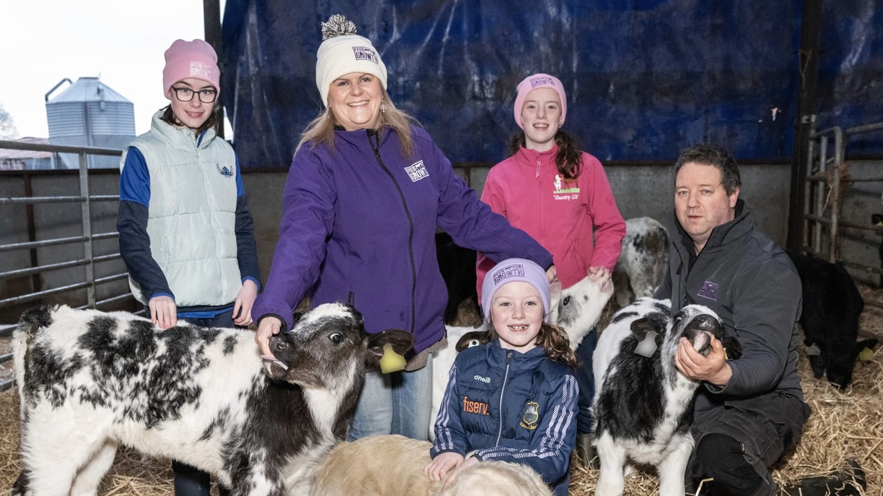 Family farming in Tipperary. Michael Hackett, his daughters Siobhan, Amy, and Molly and their dog Rainbow Skye meet Una Hickey of Volac Milk Replacers Ireland in their calf shed