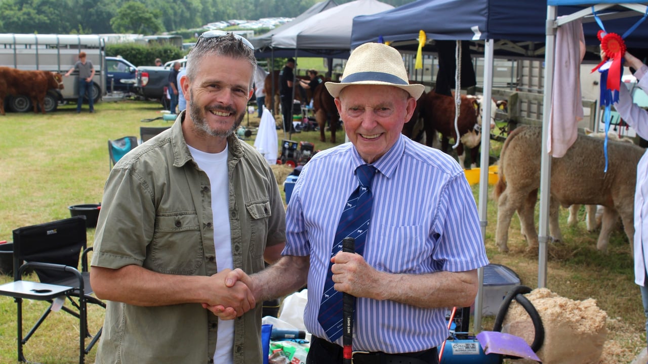 NI agriculture committee chairperson, Robbie Butler MLA, congratulates noted Charolais breeder, Albert Connolly, who recently celebrated his 80th birthday