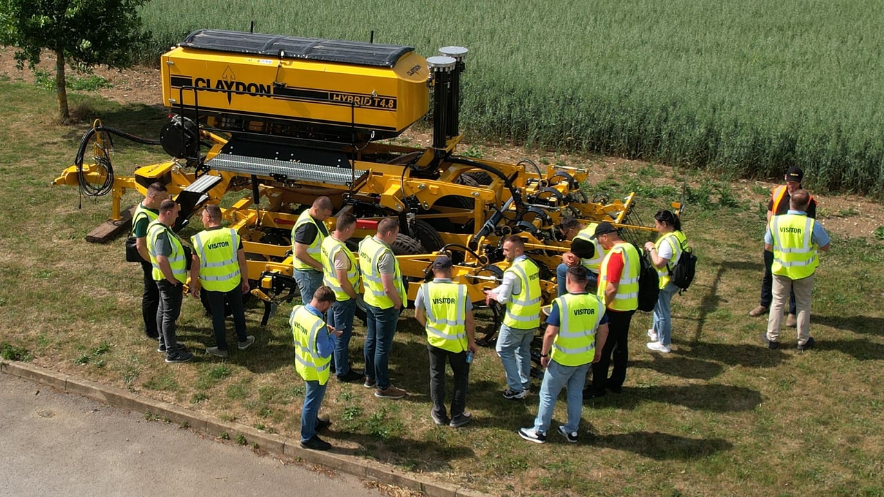 Ukraine farmers inspect a Claydon Hybrid trailed direct drill, a model which is popular on large-scale farms in eastern Europe
