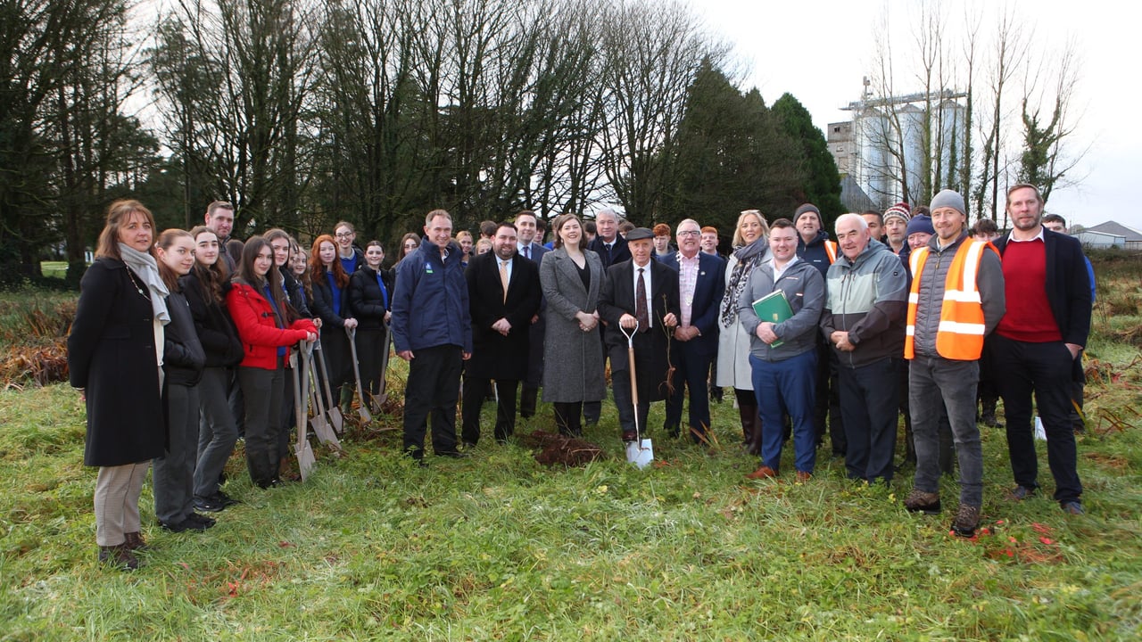 Minister of State Michael Healy-Rae, with students and staff at Castleisland Community College who are planting a native woodland