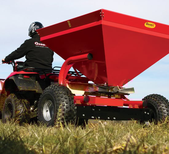 Quad-X spreader designed with wide axle to increase stability
