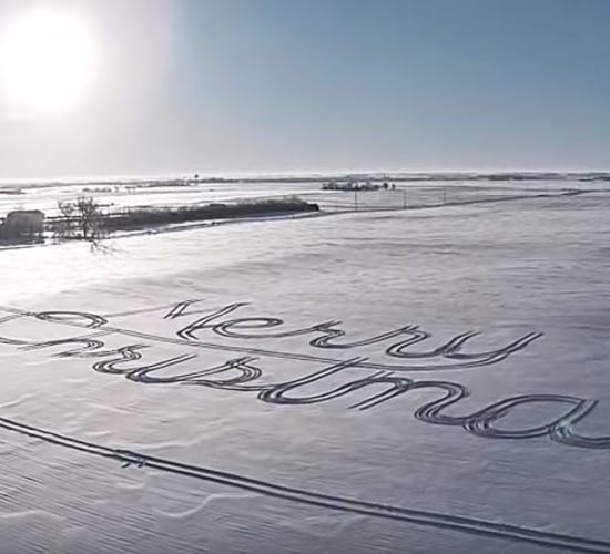 Video: Farmer creates 'Merry Christmas' in snow with tractor