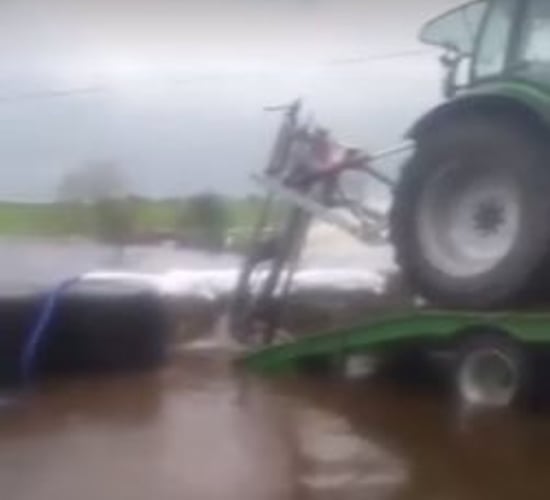 Video: Watch a Galway farmer use bales and a slurry agitator to keep flood water at bay