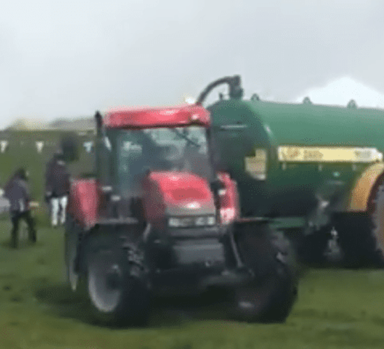 Watch a farmer use a load of slurry to get rid of protesters in his field