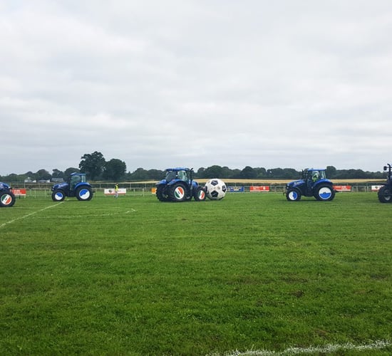 Marty Morrissey takes on the challenge of tractor football at the Ploughing
