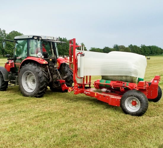 How to make a bale wrapper turn faster...without the bale falling off