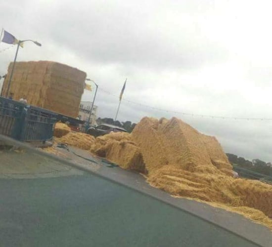 Pic: Traffic chaos as truck partially loses its load of bales