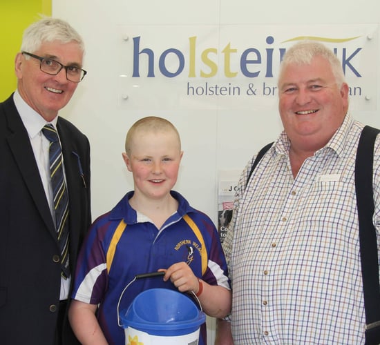 14-year-old raises £1,800 after shaving head for 'proud papa'