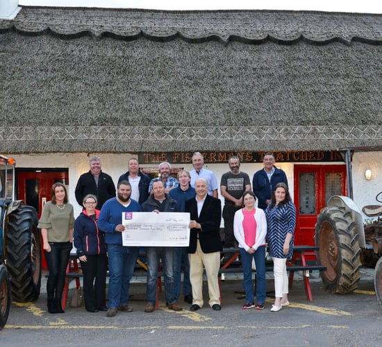Classic and modern tractors hit the road for charity