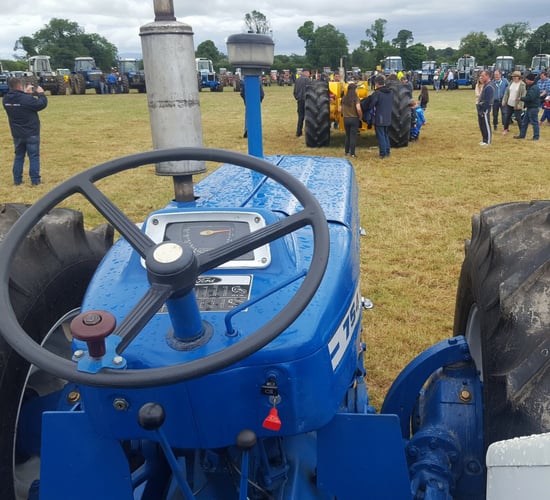 The road to 'Tipp': 99 County tractors cluster together in one field