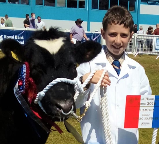 Young Limousin breeder manages major show hat-trick