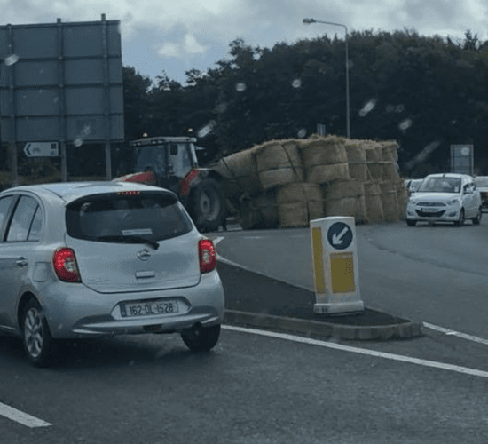 Trailer of bales overturns in Donegal