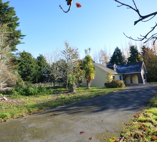 Residential roadside property offers access to beaches
