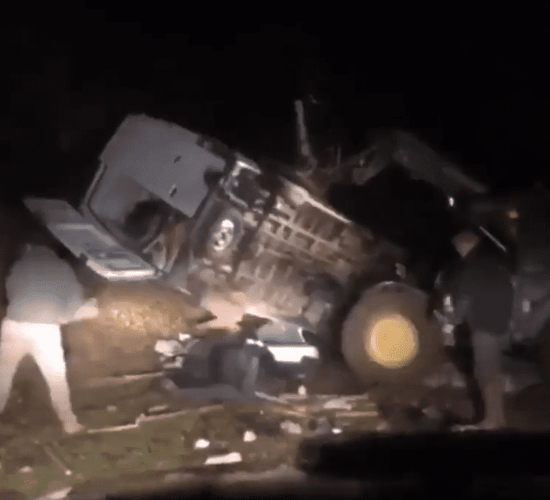 Farmer overturns van 'dumping rubbish' on his land