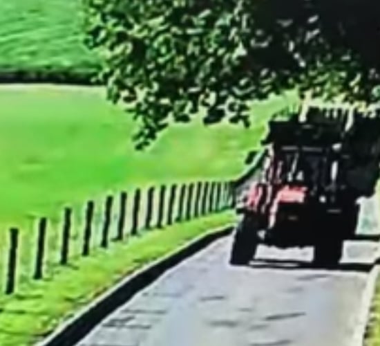 Video: Bale trailer breaks loose from towing tractor