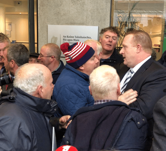 Video: Farmers' tempers fly in standoff with MII director