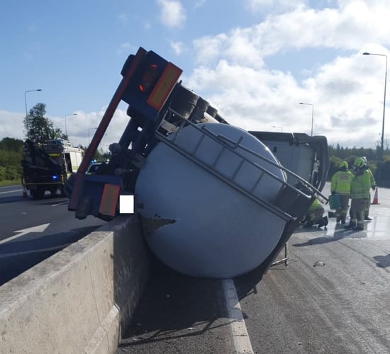 Emergency services attend incident involving milk tanker