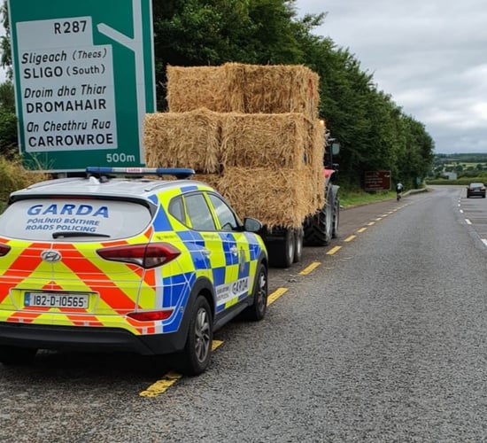 'Writing on the wall' for tractor driver drawing bales