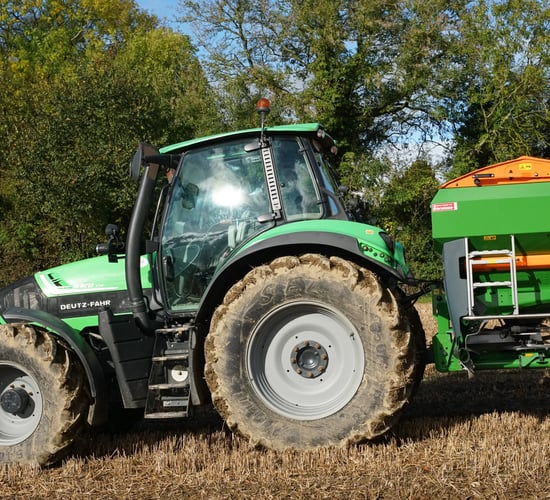 Checking the spreader to save on fertiliser costs