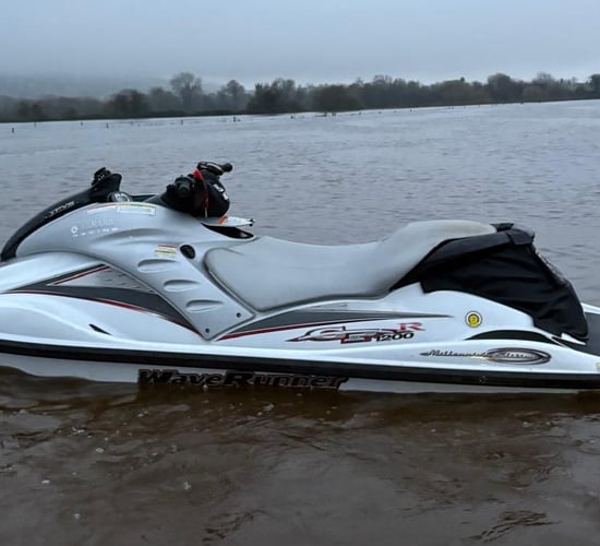 Watch: Young farmer jet-skis across flooded field
