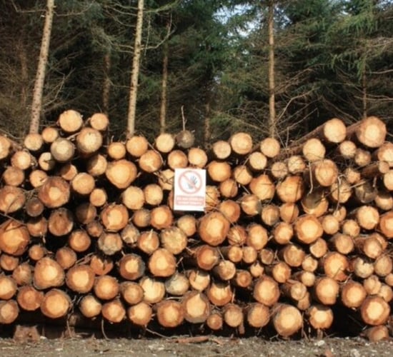 How should harvested timber stacks be estimated?