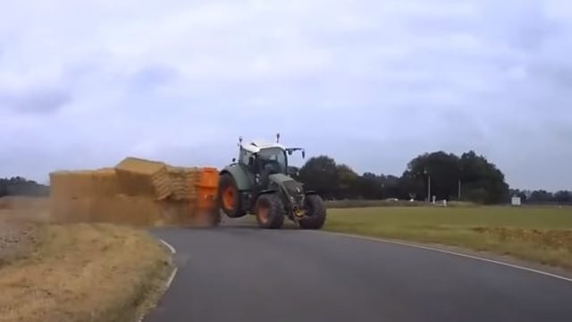Video: How not to go around a corner with a trailer of bales