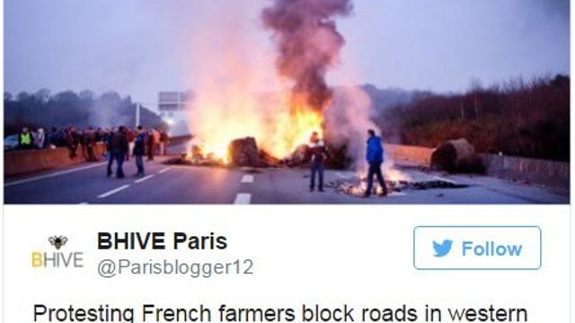 Pics: Protesting French farmers set tyres on fire and block roads with tractors