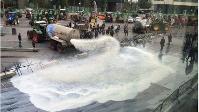 Tankers spray 40,000L of milk over EU buildings in Luxembourg in protest