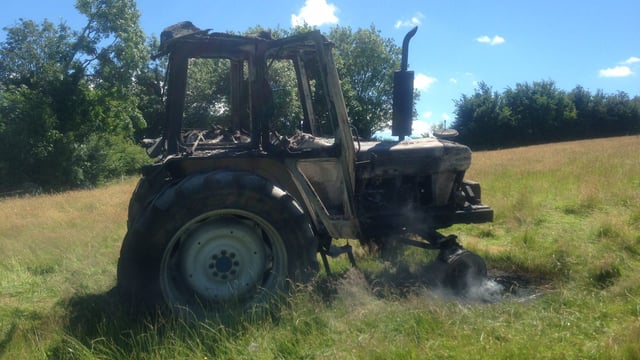 Contractor has lucky escape as tractor goes on fire in hay field