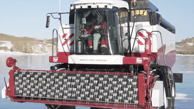 Video: Watch a high-powered tractor and combine 'skating' on ice