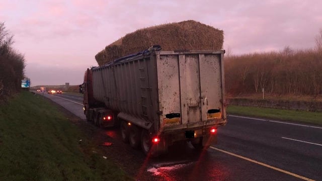 Pics: Lucky escape for motorists as bales fall from lorry on motorway
