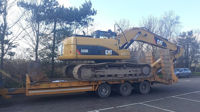 Pic: Tractor hauling excavator stopped for using 'green' diesel and being overweight